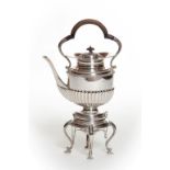 A HEAVY SILVER TEA KETTLE ON STAND