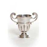 A LARGE TWO-HANDLED SILVER TROPHY CUP