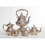 A VERY ATTRACTIVE FIVE-PIECE SILVER-PLATE TEA AND COFFEE SERVICE,