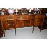 A GEORGE III PERIOD MAHOGANY BOW-FRONTED INLAID SIDEBOARD