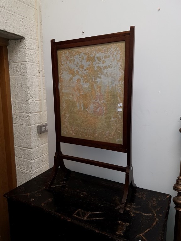 A SMALL MAHOGANY CHEVAL FIRE SCREEN