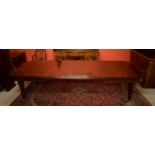 A VERY FINE LATE VICTORIAN MAHOGANY DINING TABLE