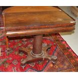 A VICTORIAN FOLD-OVER ROSEWOOD TEA TABLE