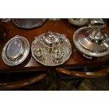 A FINE CIRCULAR SILVER TWO-HANDLED SERVING DISH