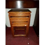 A NEST OF THREE CHINESE HARDWOOD OCCASIONAL TABLES