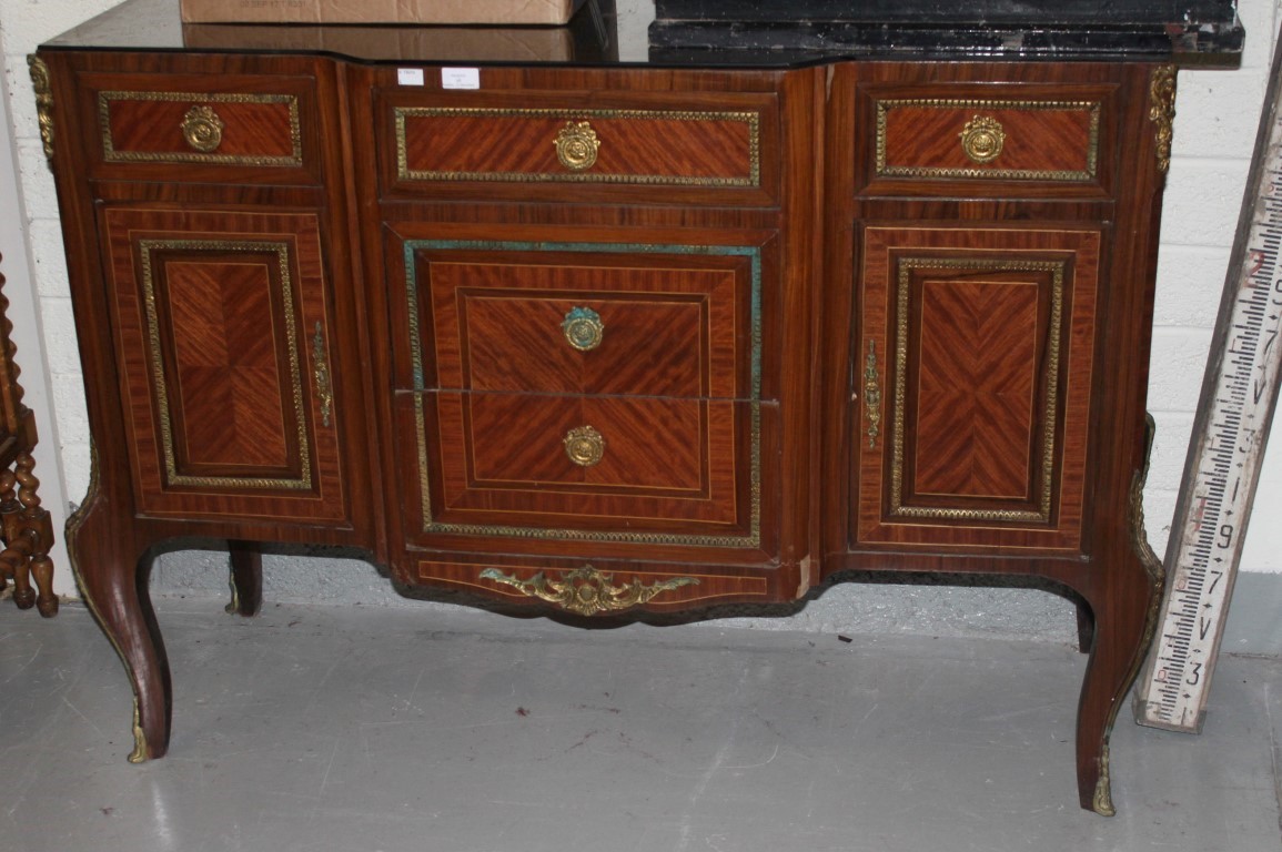 A BRASS-MOUNTED KINGWOOD COMMODE