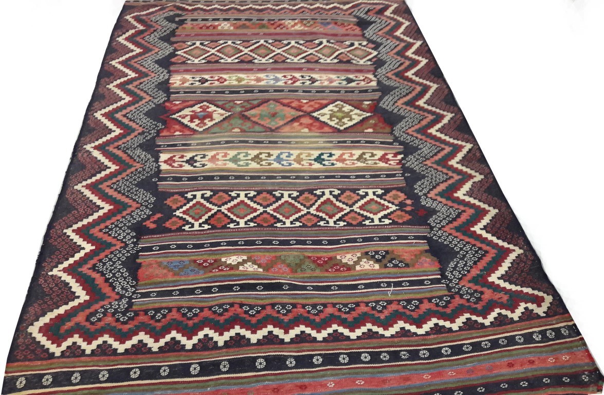 AN ORIENTAL KILIM RUG