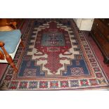 A LARGE TURKISH RUG