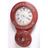 A RED PAINTED VANNER AND PREST'S ADVERTISING WALL CLOCK