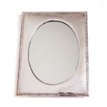 A VERY ATTRACTIVE OVAL SILVER TABLE MIRROR