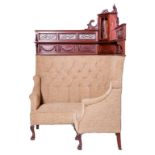 AN EDWARDIAN MAHOGANY CORNER CLUB SETTEE