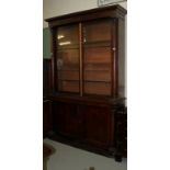 A LATE WILLIAM IV OR EARLY VICTORIAN MAHOGANY BOOKCASE