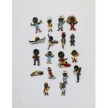 A SET OF EIGHTEEN GOLLY CORNER BROOCHES