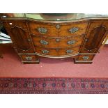 AN UNUSUAL GEORGE III STYLE MAHOGANY BOW-FRONTED SIDE BOARD