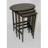 A NEST OF THREE REGENCY STYLE EBONISED AND CHINOISERIE LACQUERED OCCASIONAL TABLES,