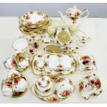 A COLLECTION OF ROYAL ALBERT OLD COUNTRY ROSES DINNER AND ORNAMENTAL WARE, INCLUDING A TELEPHONE