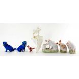 A PAIR OF KINGFISHER BLUE GLAZED PORCELAIN MODELS OF PUG DOGS AFTER A MEISSEN ORIGINAL, 11CM H,