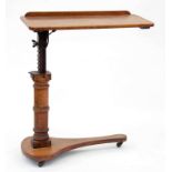 AN EDWARDIAN MAHOGANY TELESCOPIC BED TABLE