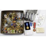 A COLLECTION OF MEDALS, MILITARY AND OTHER CAP BADGES, SHOULDER TITLES, BUTTONS AND OTHER INSIGNIA