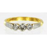 A DIAMOND THREE STONE RING, IN GOLD MARKED 18CT, 3.1G