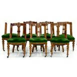 A SET OF SEVEN CARVED OAK VICTORIAN GRECHIN PATTERN DINING CHAIRS (SOME WITH FAULTS)