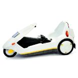 A SINCLAIR C5 ELECTRIC VEHICLE ADAPTED TO RUN FROM A CAR BATTERY COMPLETE SINCLAIR POWER PACK,