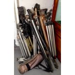 A QUANTITY OF PROFESSIONAL PHOTOGRAPHER'S ALLOY AND WOOD FOLDING TRIPODS INCLUDING KENNETT, SLIK,