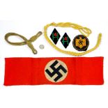 WORLD WAR II. A GERMAN, THIRD REICH, COTTON AND RED FELT SWASTIKA ARM BAND AND OTHER ITEMS OF