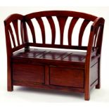 A MAHOGANY BOX SETTLE WITH PANELLED FRONT AND LID, 110CM W