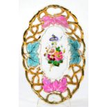 A CARL TIELSCH PORCELAIN PIERCED DISH PAINTED WITH FLOWERS AND MOULDED WITH LEAVES, 28.5CM W MARK,