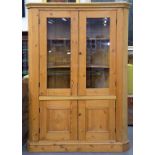 A VICTORIAN AND LATER WAXED PINE CORNER CUPBOARD, 200 X 140CM