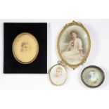 AN EARLY 20TH CENTURY OVAL GILT BRASS PHOTOGRAPH FRAME, A MINIATURE OF A LADY, CIRCA 1900 AND TWO