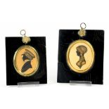 TWO EARLY 19TH CENTURY SILHOUETTES, INK AND WASH OR GOLD ON CARD, PAPIER MACHE FRAMES WITH BRASS