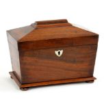 A VICTORIAN MAHOGANY TEA CADDY OF SARCOPHAGUS SHAPE, WITH FITTED INTERIOR, 22CM W