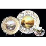 A SAMPSON HANCOCK PLATE PAINTED BY EDWIN TROWELL,WITH LANDSCAPE IN GILT BORDER, SIGNED AND