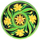 NEWHALL EARTHENWARE PLAQUE DECORATED WITH DAFFODILS AND FOLIAGE, GREEM STAMP TO UNDERSIDE, 29CM