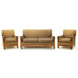 AN EARLY 20TH C THREE PIECE SUITE WITH CARVED OAK FRAME