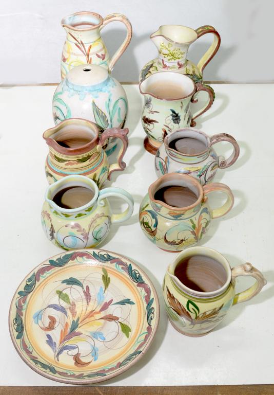 A COLLECTION OF TEN ITEMS OF DENBY GLYN WARE, MAINLY INCLUDING JUGS WITH HAND PAINTED SIGNATURE IN