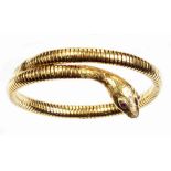 A VICTORIAN GOLD ARTICULATED SNAKE BANGLE, WITH RED CABOCHON EYES, 22G