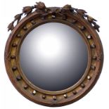 A 19TH CENTURY GILTWOOD MIRROR WITH CONVEX PLATE, 62CM DIAM, INCOMPLETE