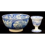 A BLUE PRINTED EARTHENWARE EGG CUP, 6.5CM HIGH AND A MILKMAID PATTERN SLOP BOWL, C1820