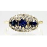 A SAPPHIRE AND DIAMOND RING, IN 18CT GOLD, SIZE X, 5.5G