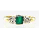 AN EMERALD AND DIAMOND THREE STONE RING IN 18CT GOLD, SIZE L, 3.8G