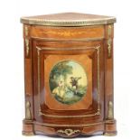 A LOUIS XVI STYLE BRASS MOUNTED MAHOGANY AND INLAID ENCOIGNURE, 20TH C with pink marble slab, the