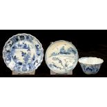 A CHINESE FLUTED BLUE AND WHITE TEA BOWL AND SAUCER PAINTED WITH PANELLED LANDSCAPES AND DIAPER,