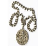 A VICTORIAN SILVER LOCKET, CHASED WITH HINDU DEITIES AND A CONTEMPORARY SILVER COLLAR, C1880, 57G