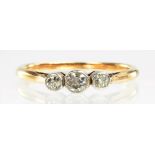 A DIAMOND THREE STONE RING IN GOLD, SIZE O, 2.4G