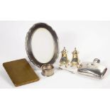 A GEORGE V SILVER SHAPED OVAL PHOTOGRAPH FRAME, 17CM H, BIRMINGHAM 1920, A PAIR OF SILVER