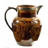 A SILVER MOUNTED OCHRE PRINTED BROWN GLAZED EARTHENWARE CHINOISERIE JUG, C1820, THE SILVER MOUNT