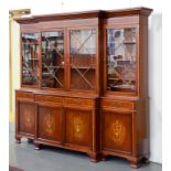 AN INLAID MAHOGANY BREAKFRONT BOOKCASE, THE UPPER PART WITH GLAZED DOORS, 211CM H X 231CM W X 45CM